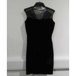 A 1960's Kitty Copeland sleeveless black velvet cocktail dress.