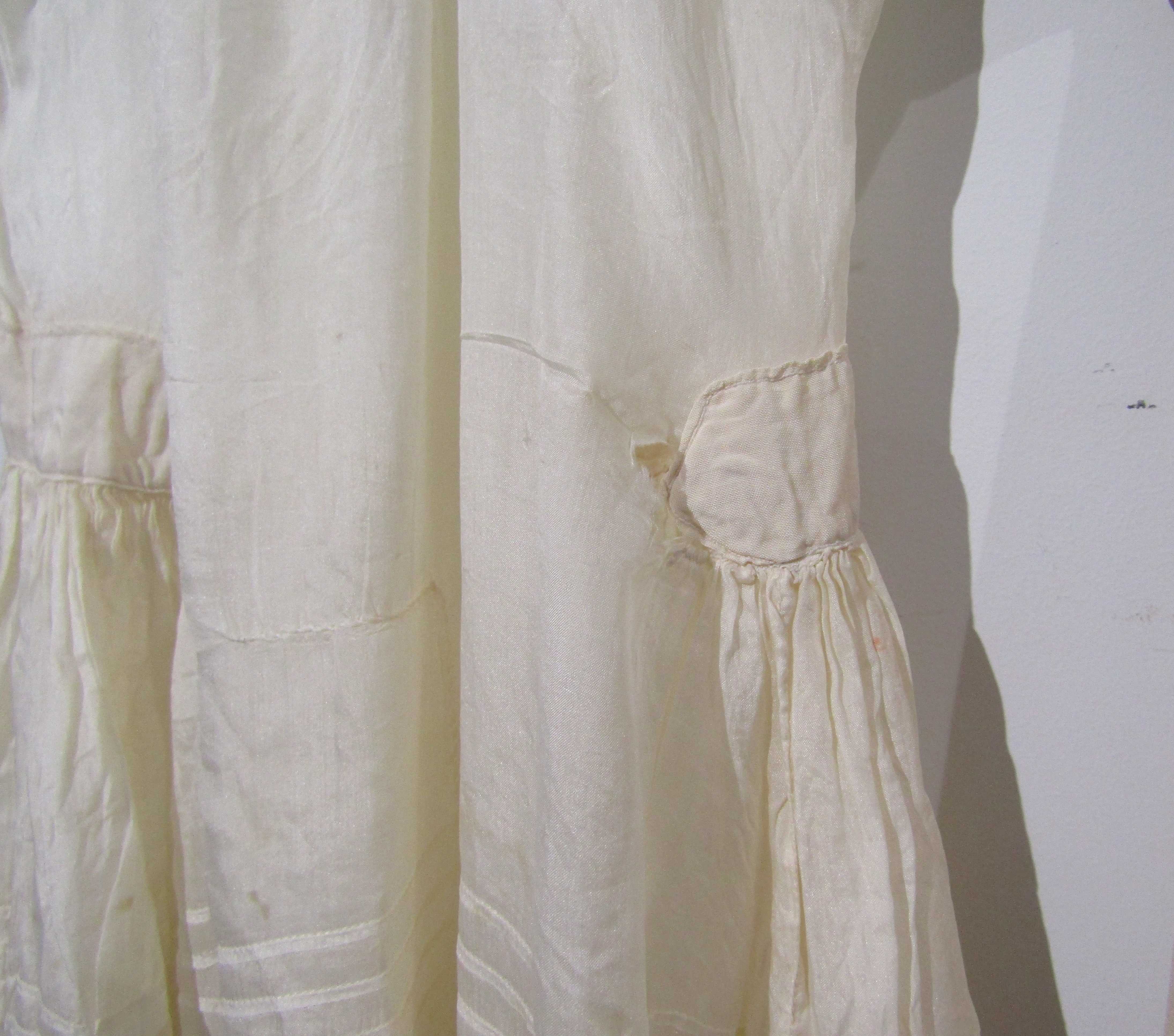A cream Victorian lace under skirt measuring 107cm waist to hem. - Image 2 of 2
