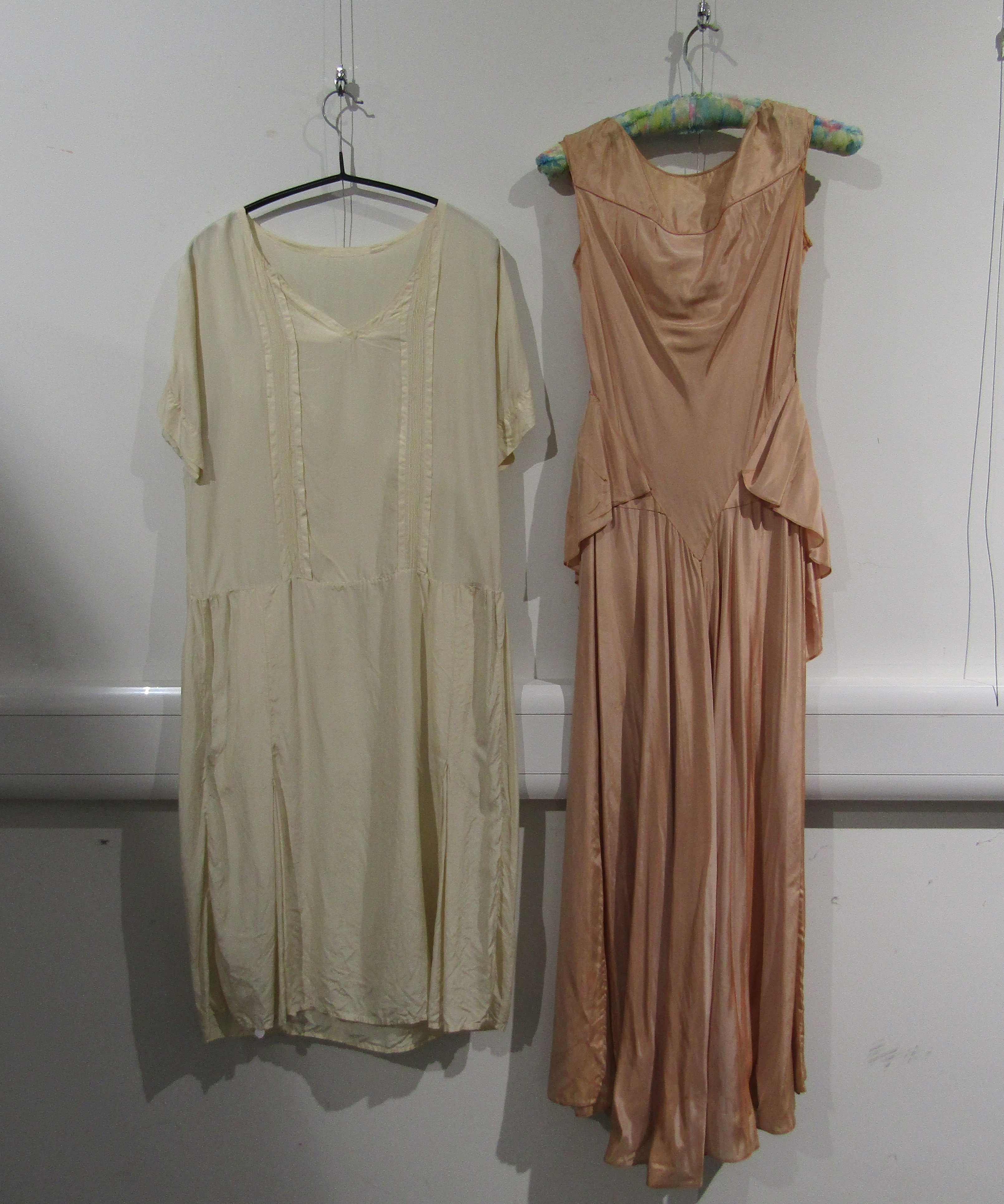 A 1930's peach full length evening dress, loose pleated effect to the hip,