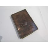 A Chinese white metal wallet with a design of birds, bamboo and flowers in high relief, monogrammed,