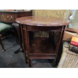 An Arts & Crafts mahogany centre table with undertier,