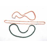 Two coral bead necklaces and a malachite bead necklace