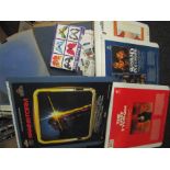 A box of videodiscs, 78's,