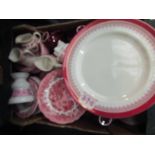 A box of pink and white ceramics including Doulton plates