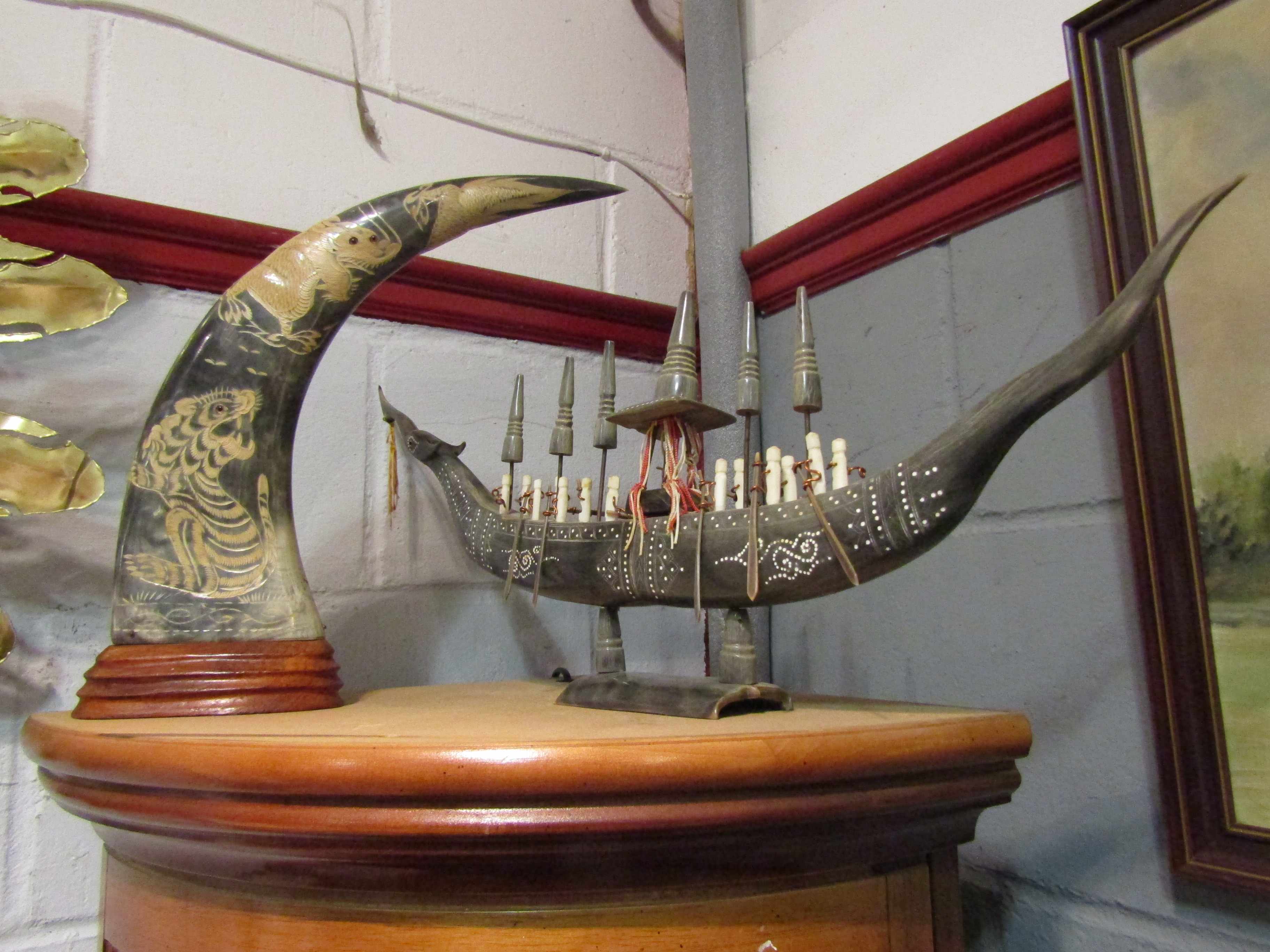 A horn ship and a carved horn depicting dragon and tiger (2)