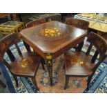 An Italian Indian rosewood games table with marquetry floral inlay.
