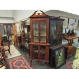 An Edwardian Art Nouveau influenced corner cabinet with brass inlay,