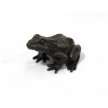 A limited edition solid bronze frog,