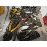 A box of various pliers, torque wrenches etc.