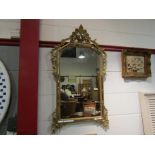 A gilt framed mirror of classical style