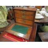 An early 20th Century stained pine three drawer engineer's chest with lockable front