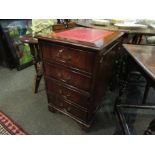 A Regency revival mahogany two drawer filing cabinet with tooled red leather top