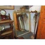 An early 19th Century gesso framed 5ft overmantel mirror with egg and dart border,