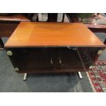 A retro teak two door TV cabinet