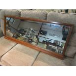 An oak overmantel mirror,