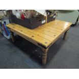 A metal studded pine square form coffee table