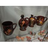 Three Royal Doulton Dewars Scotch Whisky jugs including "Bonnie Prince Charlie", "The Watchman",