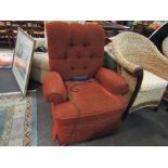 A Parker Knoll electric reclining armchair in burnt orange