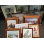 A box containing an assortment of pictures including oleographs of military scenes,