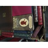 A box containing assorted volumes, leather bound examples, Sherlock Holmes etc.