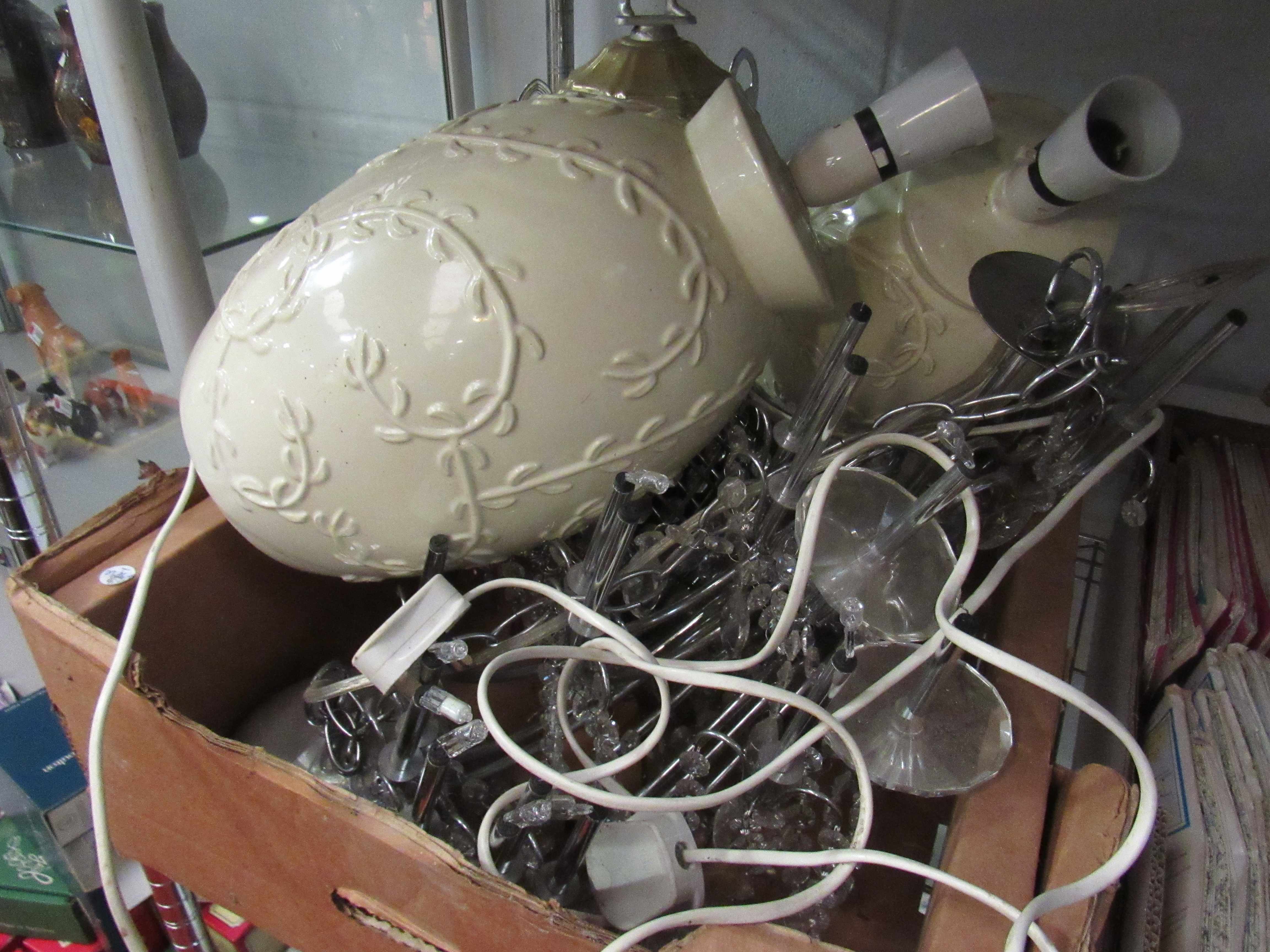 A box of modern light fittings