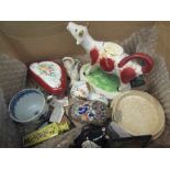 A box containing assorted items including a 19th Century cow creamer, a porcelain patch box,