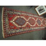 A middle Eastern geometric wool runner,