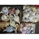 Three boxes of mixed 19th Century and later teapots including tourist and crested