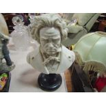 A resin bust of Beethoven on stand
