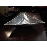 A pewter triangular bowl (34cm sides)