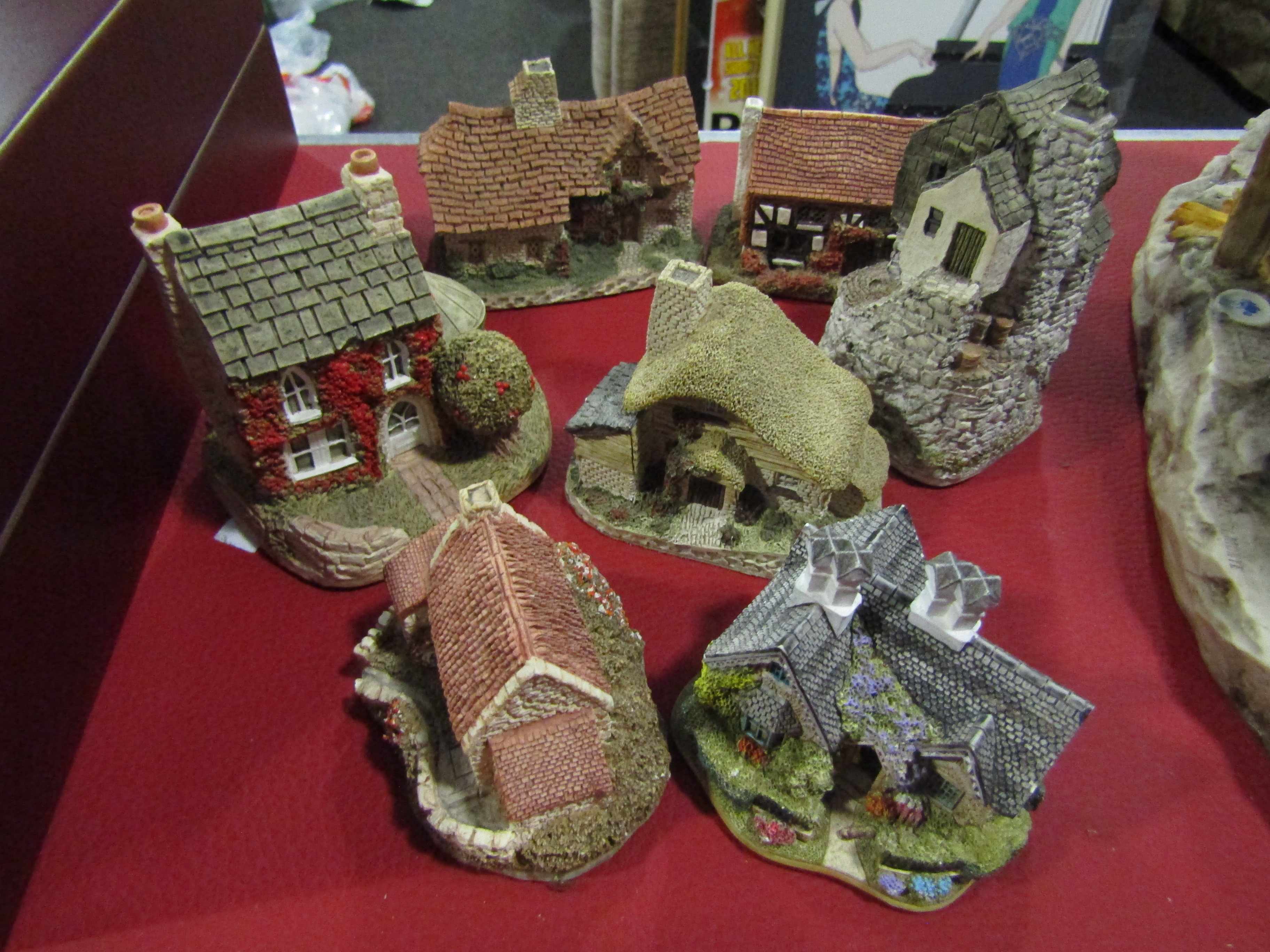 Seven Lilliput Lane and David Winter cottages including Acorn Cottage and Gamekeeper's Lodge
