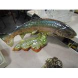 A large ceramic trout figure