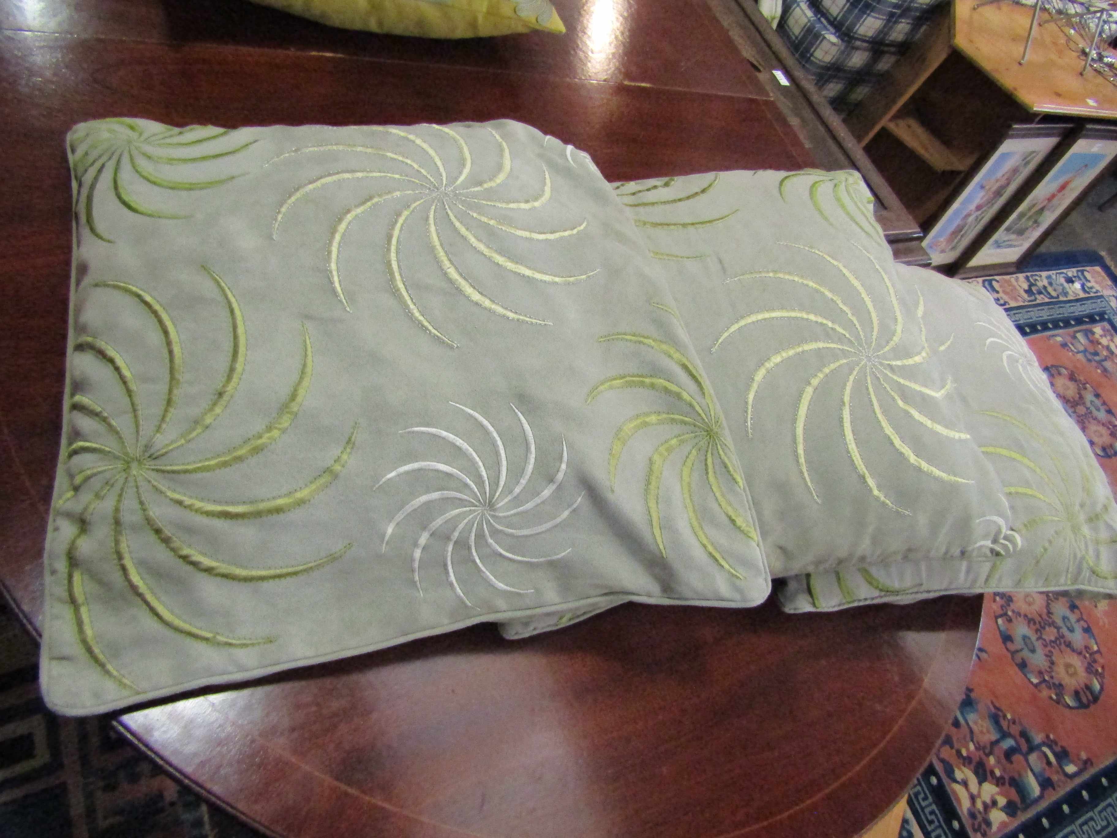 Three velour cushions with spiral design