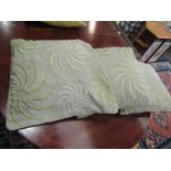 Three velour cushions with spiral design