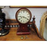 A Victorian mahogany inlaid balloon form striking mantel clock, with pendulum and key,