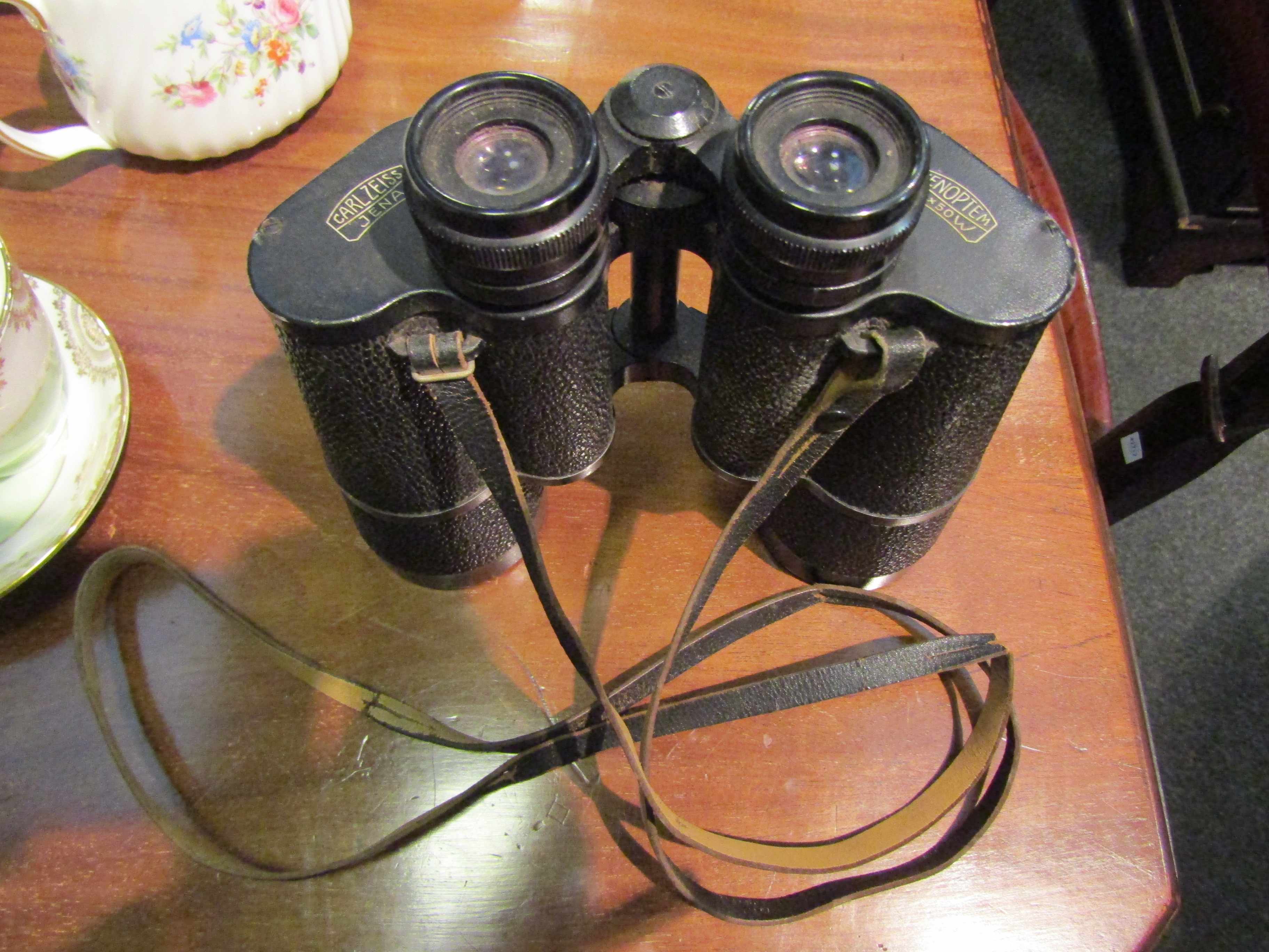 A pair of Carl Zeiss Jenoplem 10x50W binoculars