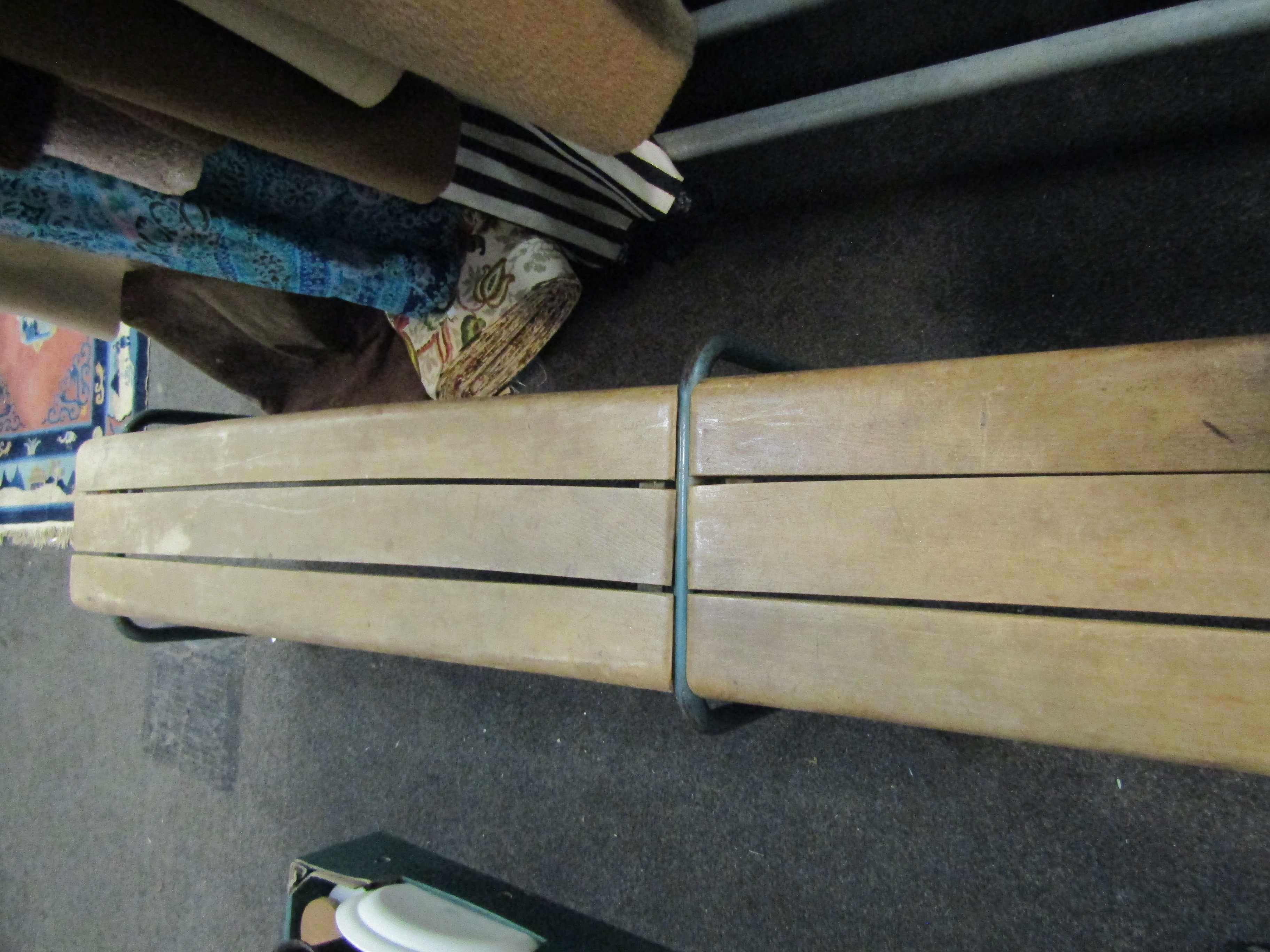 A three plank bench on metal leg frame,