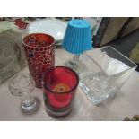 A modern glass vase, candle holders,