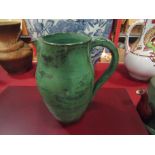 A studio pottery green jug