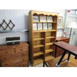 A modern pine adjustable bookshelf 104w x 34d x 210h cm