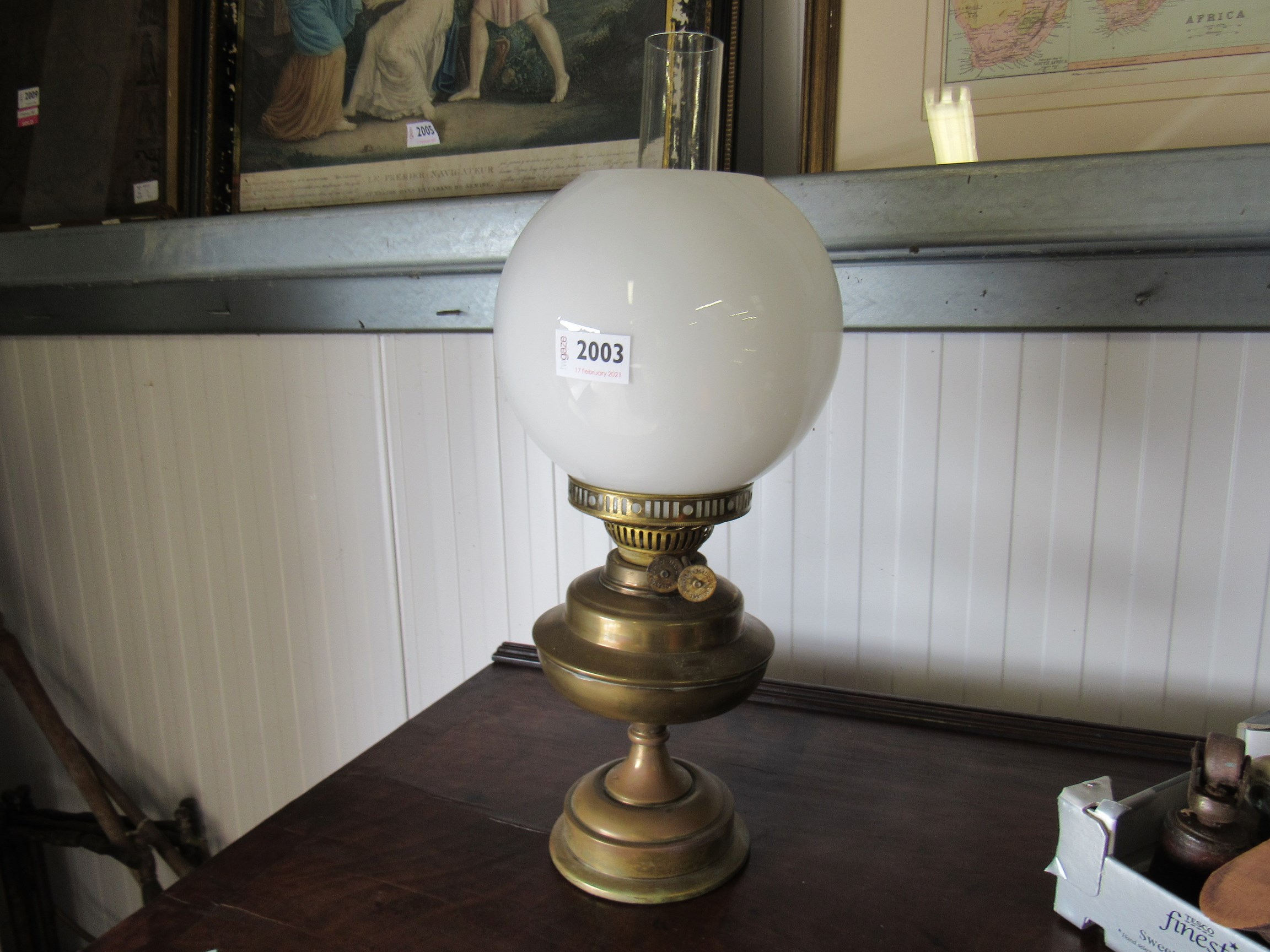 A brass oil lamp 46cm H