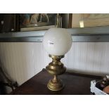 A brass oil lamp 46cm H