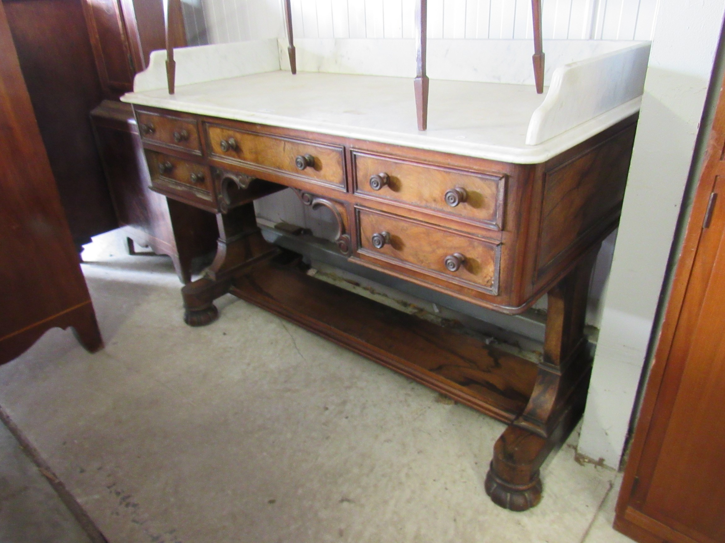 A 19th Century figured walnut washstand with marble top 122w x 59d x 76h cm