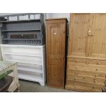 A natural pine single door narrow cupboard 47w x 62d x 178h cm