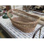 A wicker Mosses basket