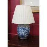 A Minister Stylise Living blue & white table lamp decorated with birds & blossom