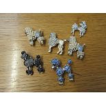 Six poodle brooches, multi coloured set with faux pearls,