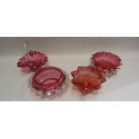 Four pieces of Victorian cranberry glass (three bowls and one basket)