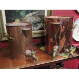 Two "Staines" copper and brass tea urns,