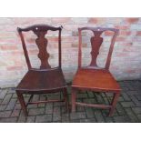 Two East Anglian oak and elm side chairs of similar design,